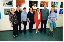 [Otwarcie wystawy fotografii Krzysztofa Bielskiego i Sławomira Szymańskiego pt. "Pasjonaci natury" w Miejskiej Bibliotece Publicznej w Szczytnie]